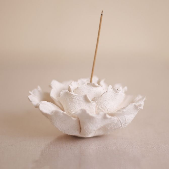 Handmade lotus incense holder with a single incense stick