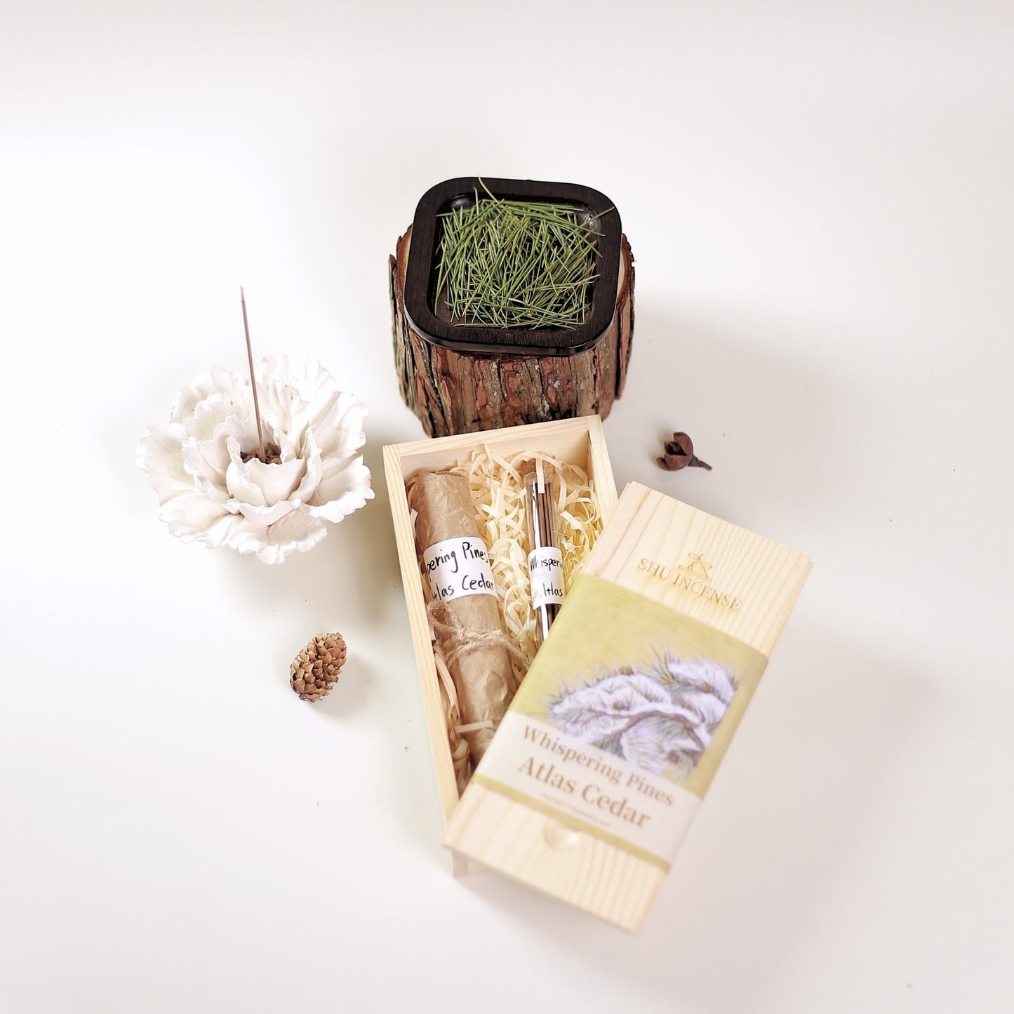 Multiple Whispering Pines cedar incense sticks arranged together | Whispering Pines