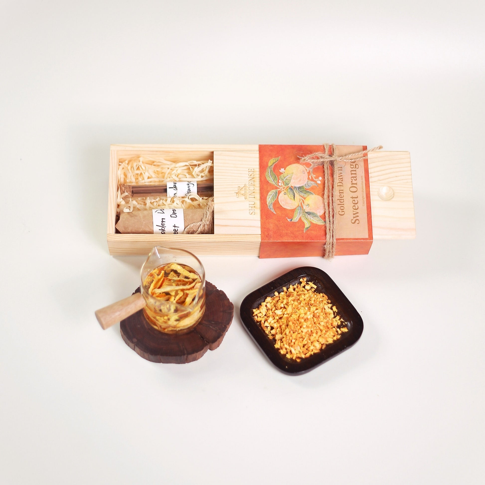 Close-up of Golden Dawn orange incense sticks | Golden Dawn